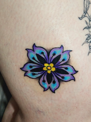 Explore tattoo ideas for black people, creative tattoo ideas in Clifton, available at Black Bucket Ink Tattoo