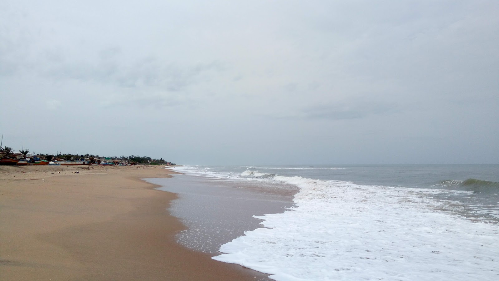 Foto de Semencheri Beach con arena beige superficie