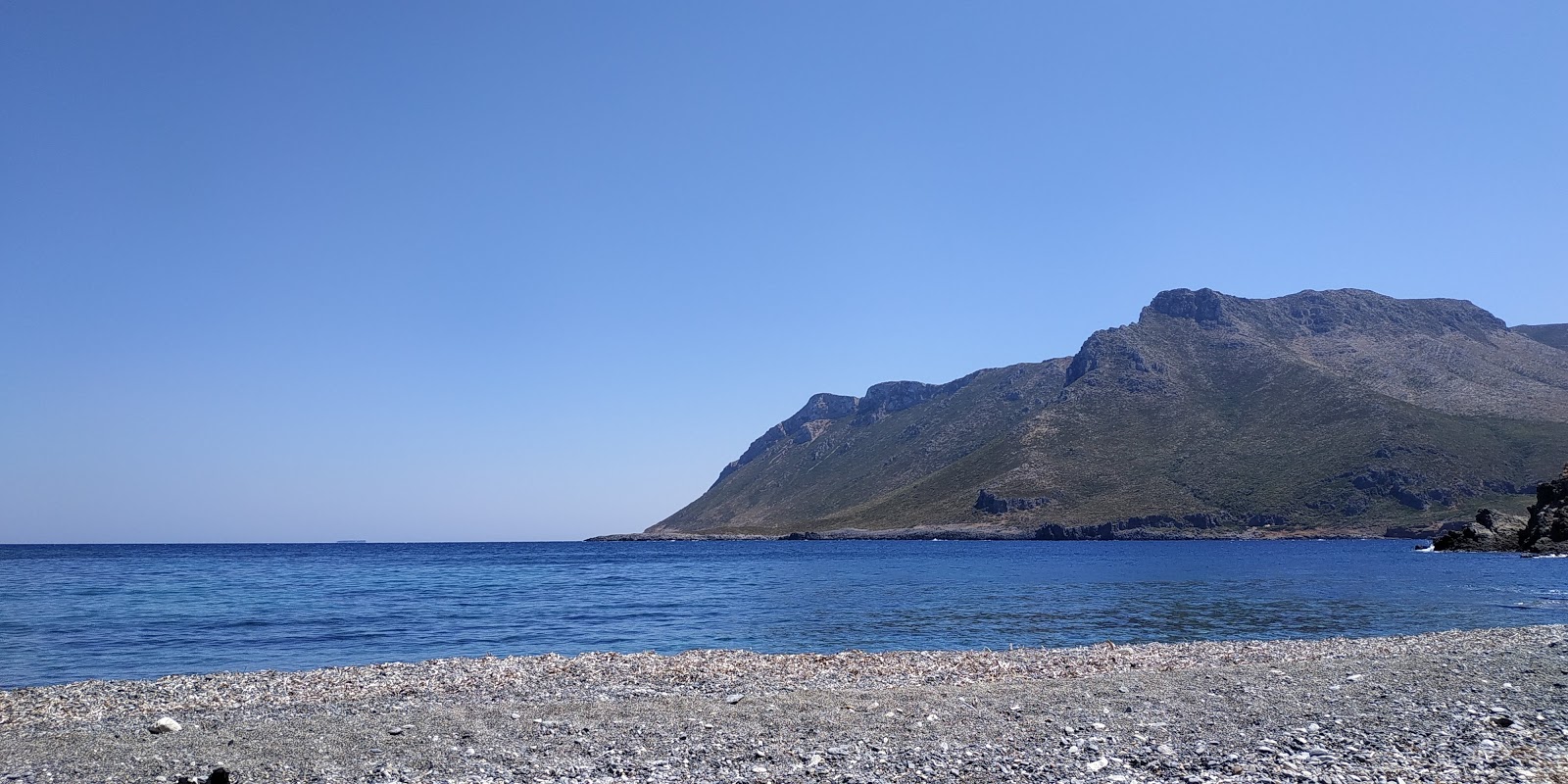 Fotografie cu Agios Georgios beach cu nivelul de curățenie înalt