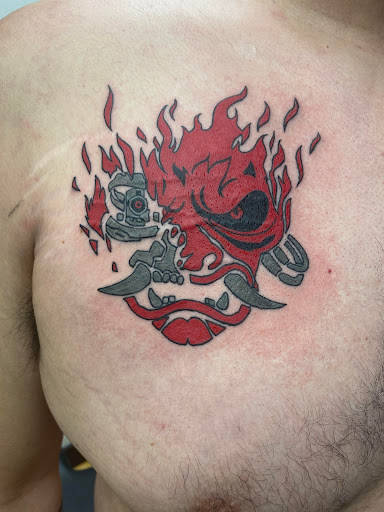 Explore mens tattoo cover up ideas, creative tattoo ideas in Sioux City, available at Thorn-Side Tattoo & Piercing