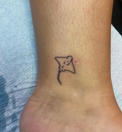 Explore tribal dragon tattoo ideas, creative tattoo ideas in Rehoboth Beach, available at Tattoo Galaxy (Rehoboth Beach) Piercing & Custom tattoos