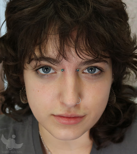 Explore ghost tattoo ideas, creative tattoo ideas in Syracuse, available at Scarab Body Arts