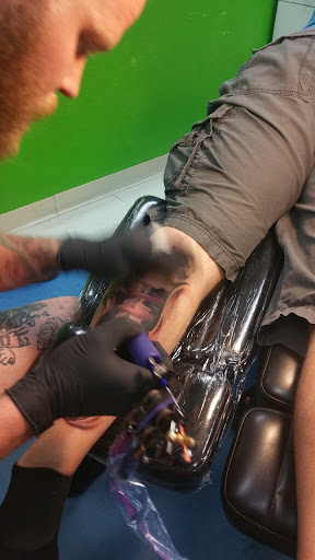 Explore neon genesis evangelion tattoo ideas, creative tattoo ideas in Sparks, available at Under Your Skin Tattoo & Body Piercing