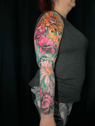Explore half sleeve tattoo design ideas, creative tattoo ideas in Englewood, available at Flamingo Noir Collective