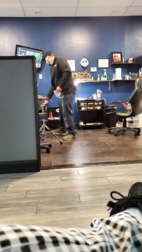 Explore dead dog tattoo ideas, creative tattoo ideas in Hudson, available at The Ink Club Tattoo Studio