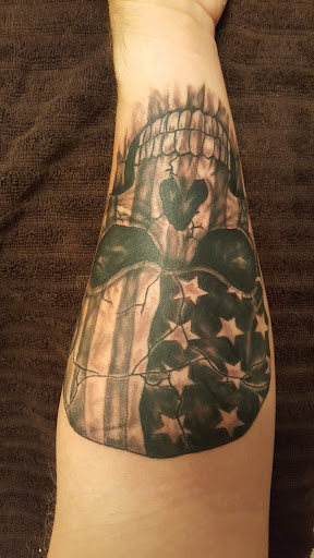 Explore face tattoos for men ideas, creative tattoo ideas in Pelham, available at Skin Worx Inc