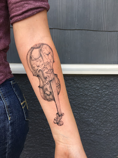 Explore brother and sister matching tattoo ideas, creative tattoo ideas in Spokane, available at Ron LeMay Tattoo