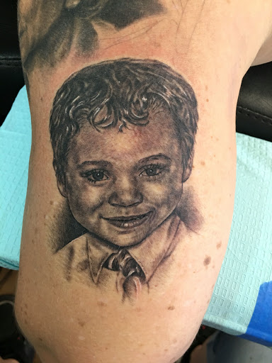 Explore killer whale tattoo ideas, creative tattoo ideas in Peoria, available at Iron Key Tattoo Studio Inc.