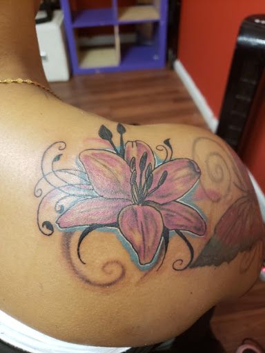 Find small mother tattoo ideas for your next unique tattoo in Detroit at Sacred Heart Tattoos
