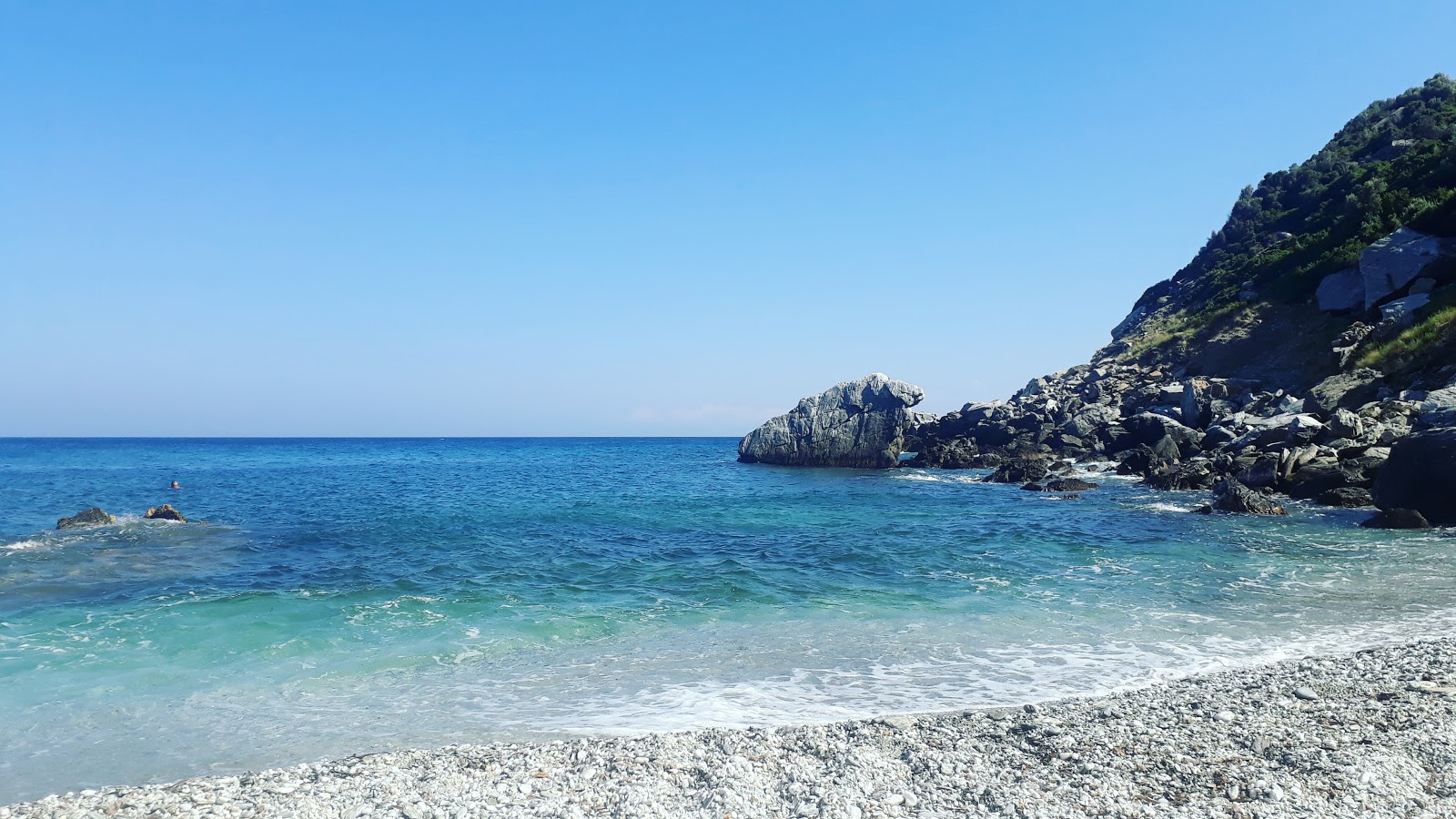 Foto van Trachelos beach met turquoise puur water oppervlakte