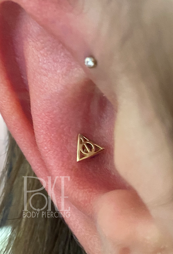 Explore cool guitar tattoo ideas, creative tattoo ideas in Norman, available at Poke Body Piercing