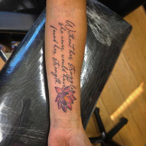 Explore womens thigh tattoo ideas, creative tattoo ideas in Lewisburg, available at Rose and Dagger Tattoo
