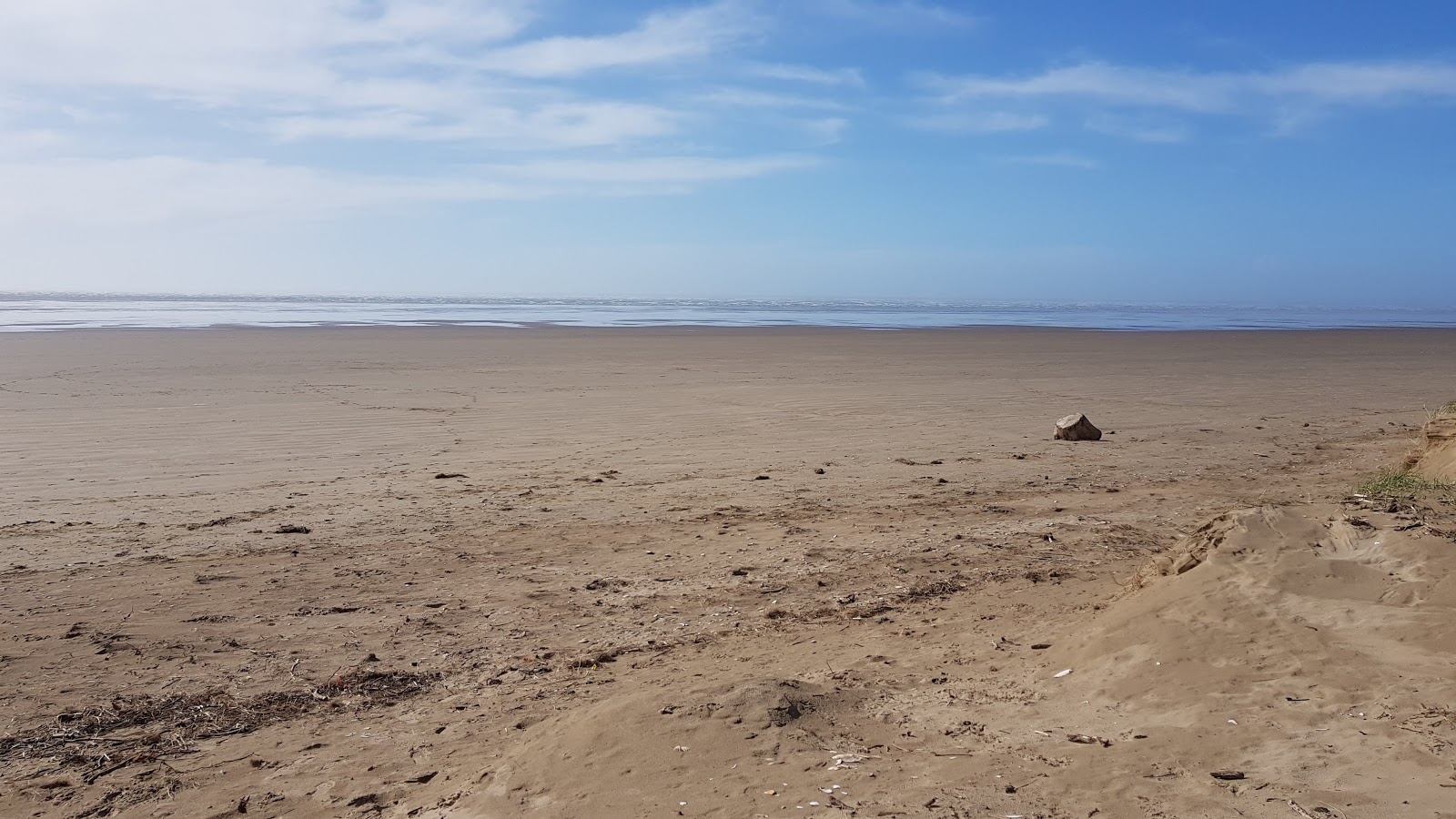 Foto av Pembrey strand med lång rak strand