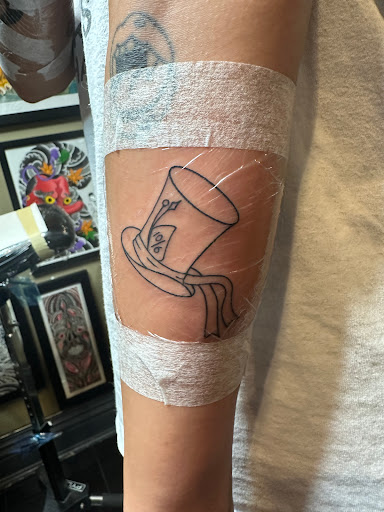 Explore cute cover up tattoo ideas, creative tattoo ideas in Massapequa, available at Kings Avenue Tattoo