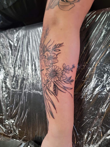 Explore wrist tattoo ideas for guys, creative tattoo ideas in Green Cove Springs, available at Under Your Skin Tattoos