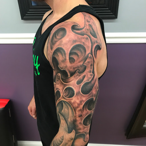 Explore minimalist dog tattoo ideas, creative tattoo ideas in Cicero, available at Serenity Tattoo