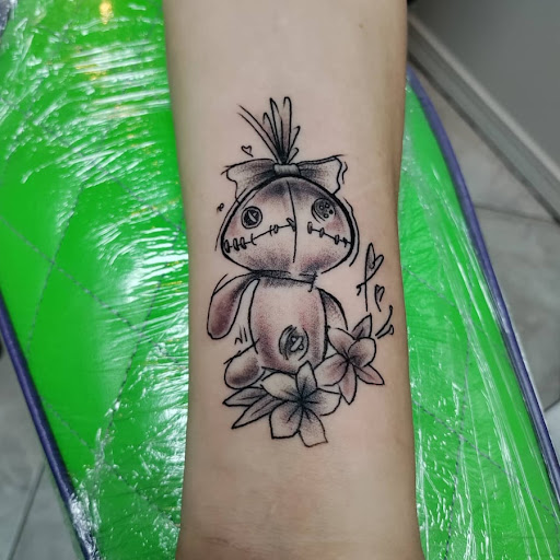 Explore paw tattoo ideas, creative tattoo ideas in Orange Park, available at All Aces Tattoo and Body Piercing LLC