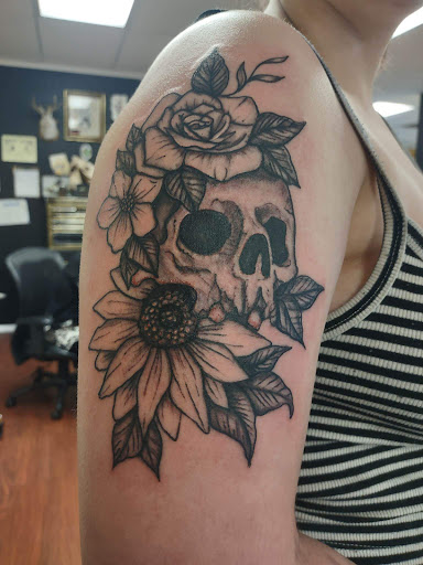 Explore tattoo word cover up ideas, creative tattoo ideas in Spokane, available at Tattoo Room