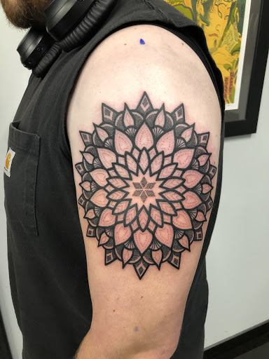 Explore temple tattoo ideas, creative tattoo ideas in Addison, available at Cat Tattoo