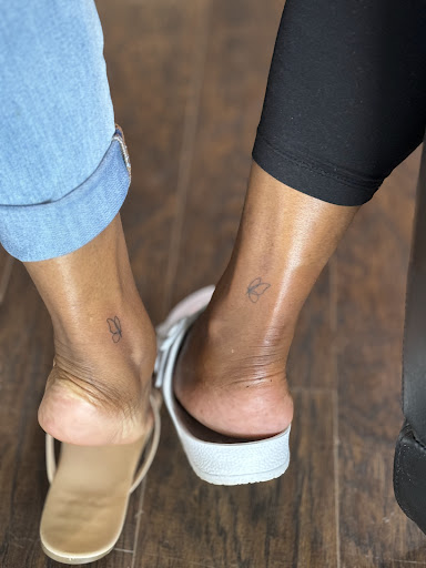 Explore red bird tattoo ideas, creative tattoo ideas in Indian Trail, available at Beauty in the ink, LLC