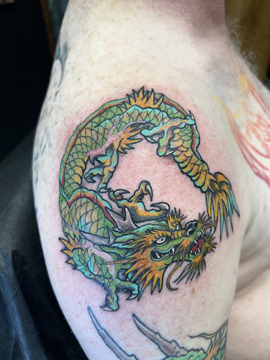 Explore female thigh tattoo ideas, creative tattoo ideas in Clearfield, available at Image Injection Tattoo & Piercing studio