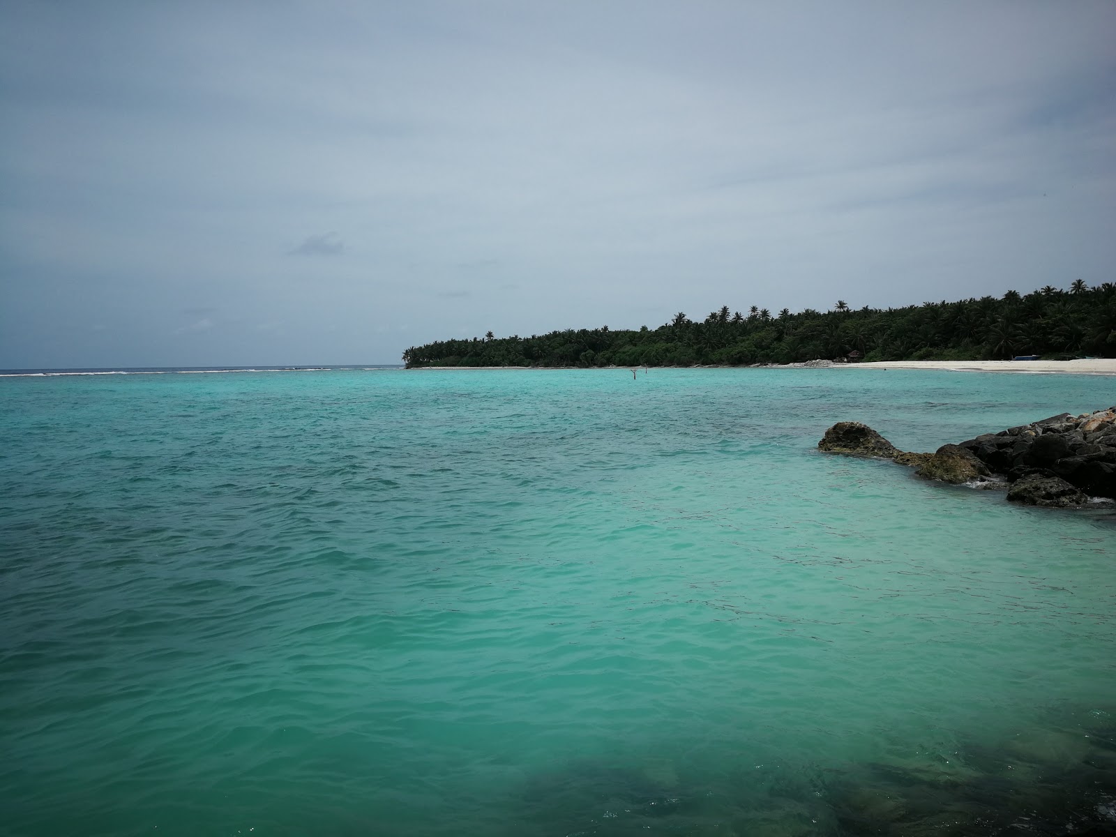 Photo de Gun'baru Beach avec rivage droit, long