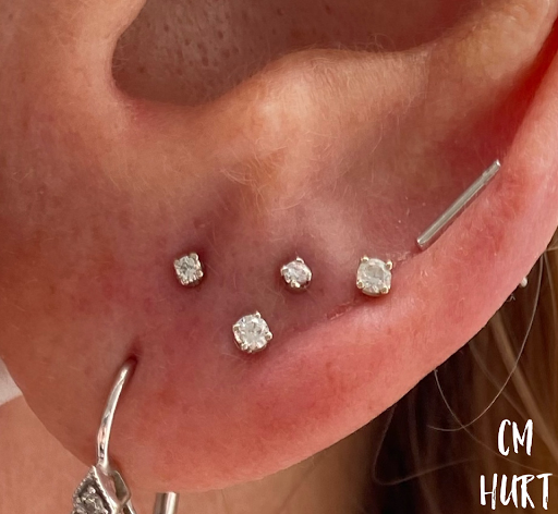 Find underboob tattoo idea for your next unique tattoo in Garden Grove at CM Hurt Piercing & Jewelry