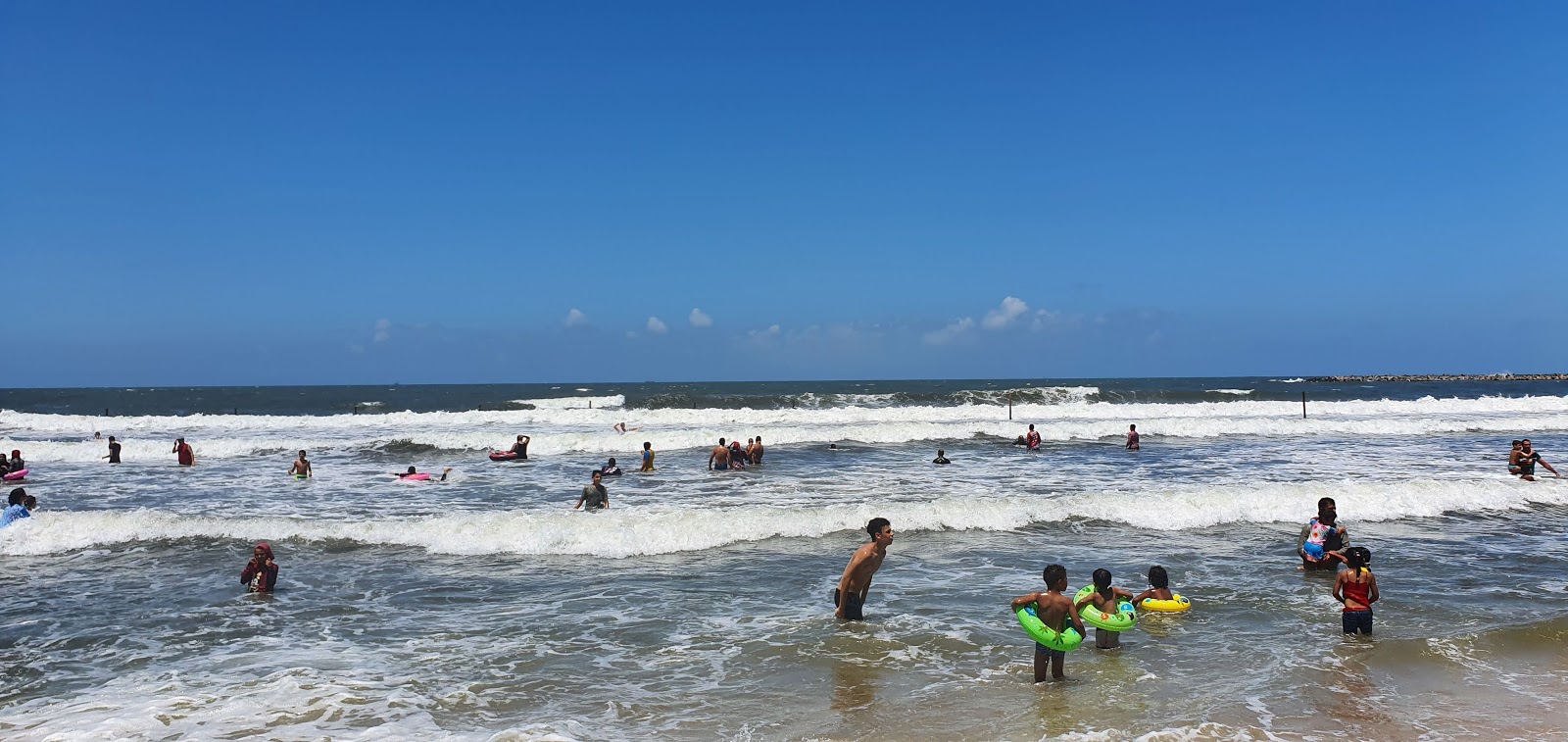 Foto van Palm Beach met recht en lang