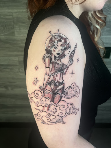 Explore black male tattoo ideas, creative tattoo ideas in Midvale, available at Dark Arts Tattoo & Dark Mark Piercing Studio