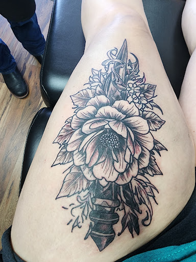Explore tattoo ideas hunting, creative tattoo ideas in Clive, available at Wild Rose Tattoo & Piercing