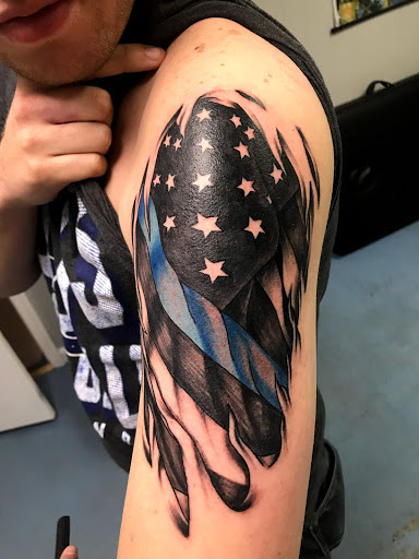 Explore tattoo ideas half sleeve forearm, creative tattoo ideas in Muncie, available at The Tattoo Studio