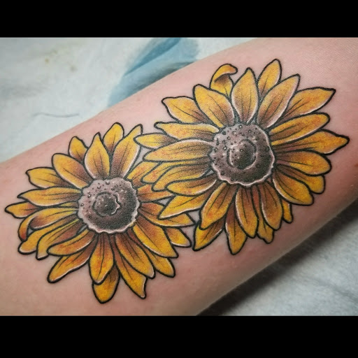 Explore ear tattoos ideas, creative tattoo ideas in Libertyville, available at Lucky Seven Tattoo