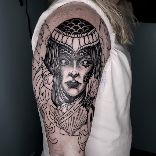 Explore redfish tattoo ideas, creative tattoo ideas in Calhoun, available at A Sailors Grave Tattoo Parlor