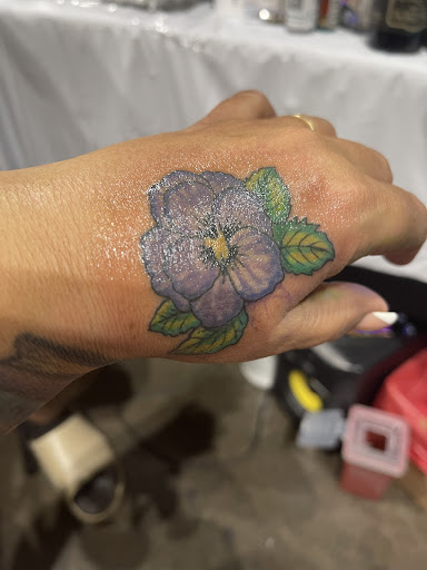 Explore emerald tattoo ideas, creative tattoo ideas in Winter Park, available at Forged Empire Tattoo Studio