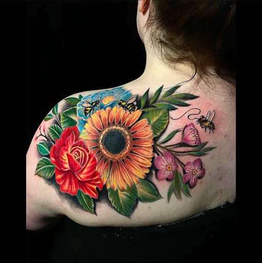 Explore upper arm tattoo ideas for women, creative tattoo ideas in Montgomery, available at Flying Eye Tattoo Studio