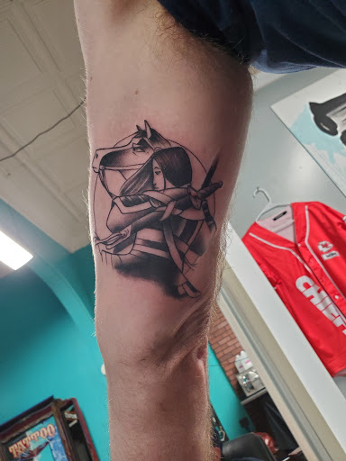 Explore atlas tattoo ideas, creative tattoo ideas in Council Bluffs, available at Lil Bros Tattoo