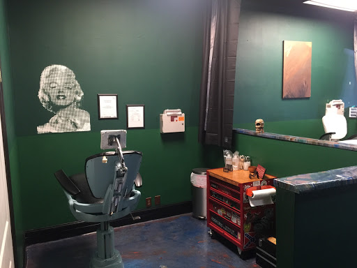 Explore cake tattoo ideas, creative tattoo ideas in Greenwood, available at Emerald City Tattoos