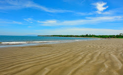 Zdjęcie Negras beach z powierzchnią niebieska czysta woda