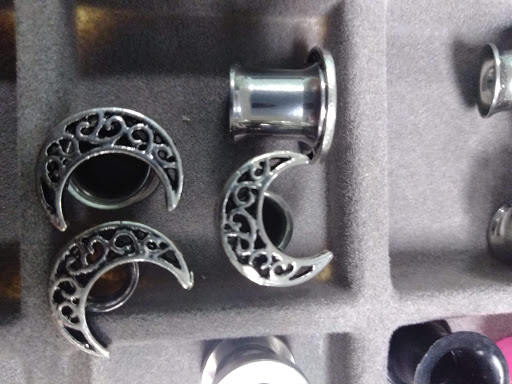 Explore unique sister tattoo ideas, creative tattoo ideas in Laurel, available at Ambitious Creations Tattoo and Piercing Studio