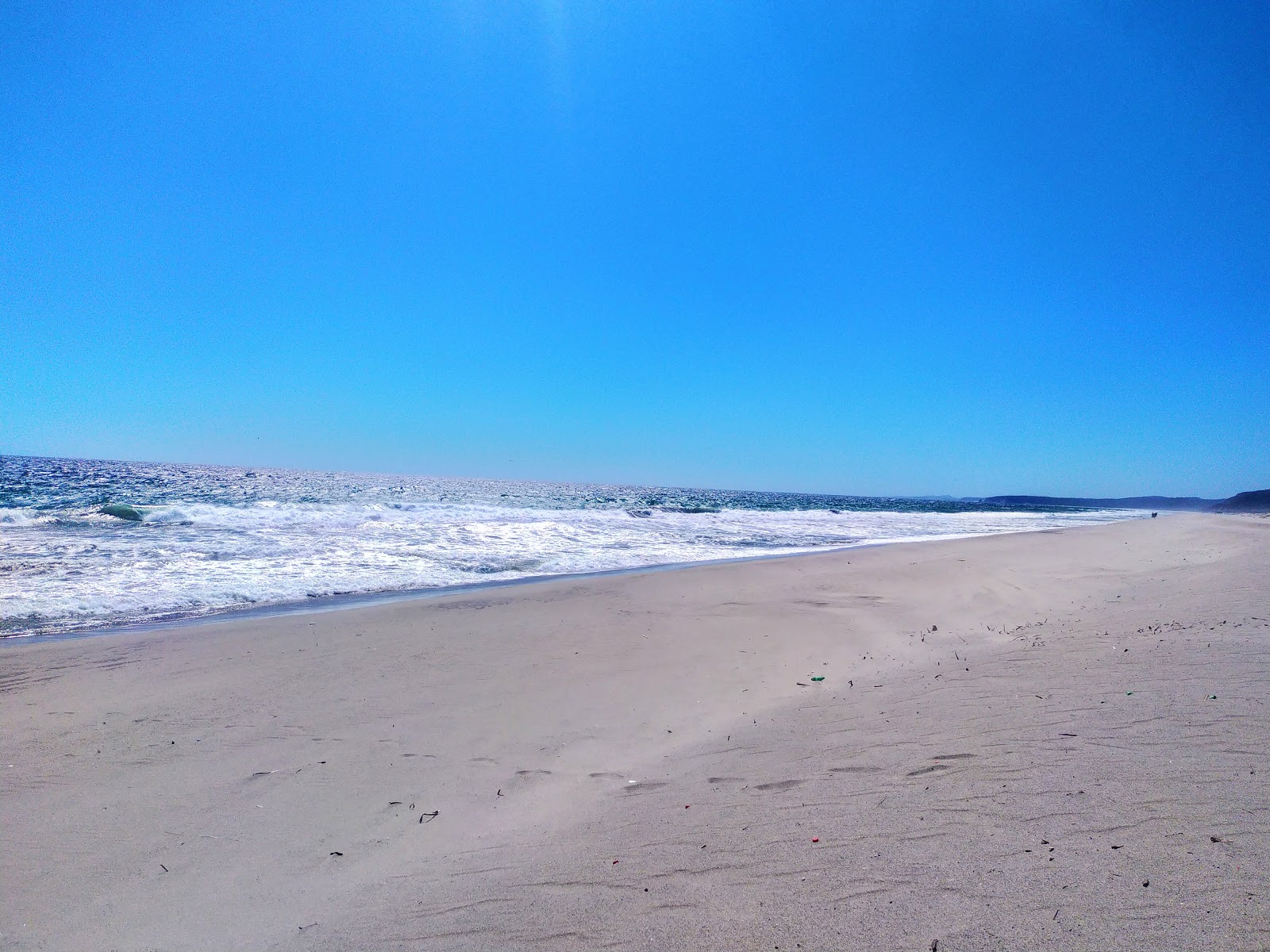 Foto de Grande beach con recta y larga