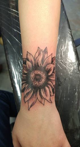 Explore elemental tattoo ideas, creative tattoo ideas in Redding, available at The Salty Sloth Tattoo