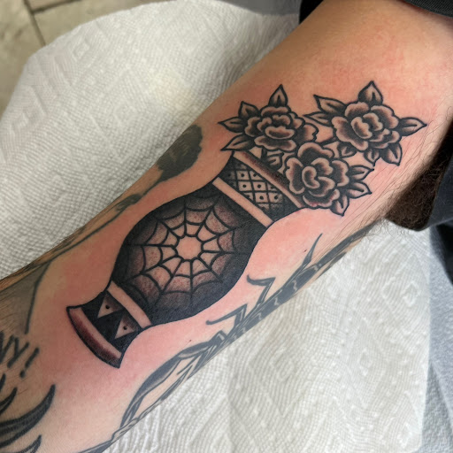 Explore sleeve forearm tattoo ideas for men, creative tattoo ideas in Boca Raton, available at Black Pelican Tattoo