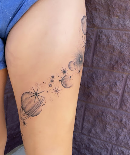 Explore red bird tattoo ideas, creative tattoo ideas in Peoria, available at Modern Ink Tattoo