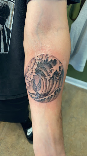 Explore tattoo ideas for passed loved ones, creative tattoo ideas in Virginia Beach, available at Studio Evolve