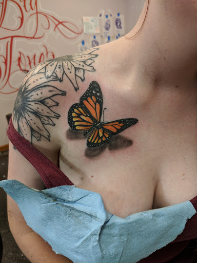 Explore woman sleeve tattoo ideas, creative tattoo ideas in Kenosha, available at Kenosha Tattoo Company