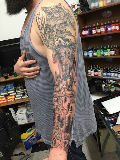 Explore dad tattoo ideas for men, creative tattoo ideas in Lawton, available at Impact Ink Tattoo Studios