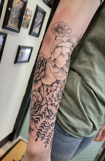 Explore tattoo ideas for dads, creative tattoo ideas in Alamosa, available at The Shop Tattoo & Comics