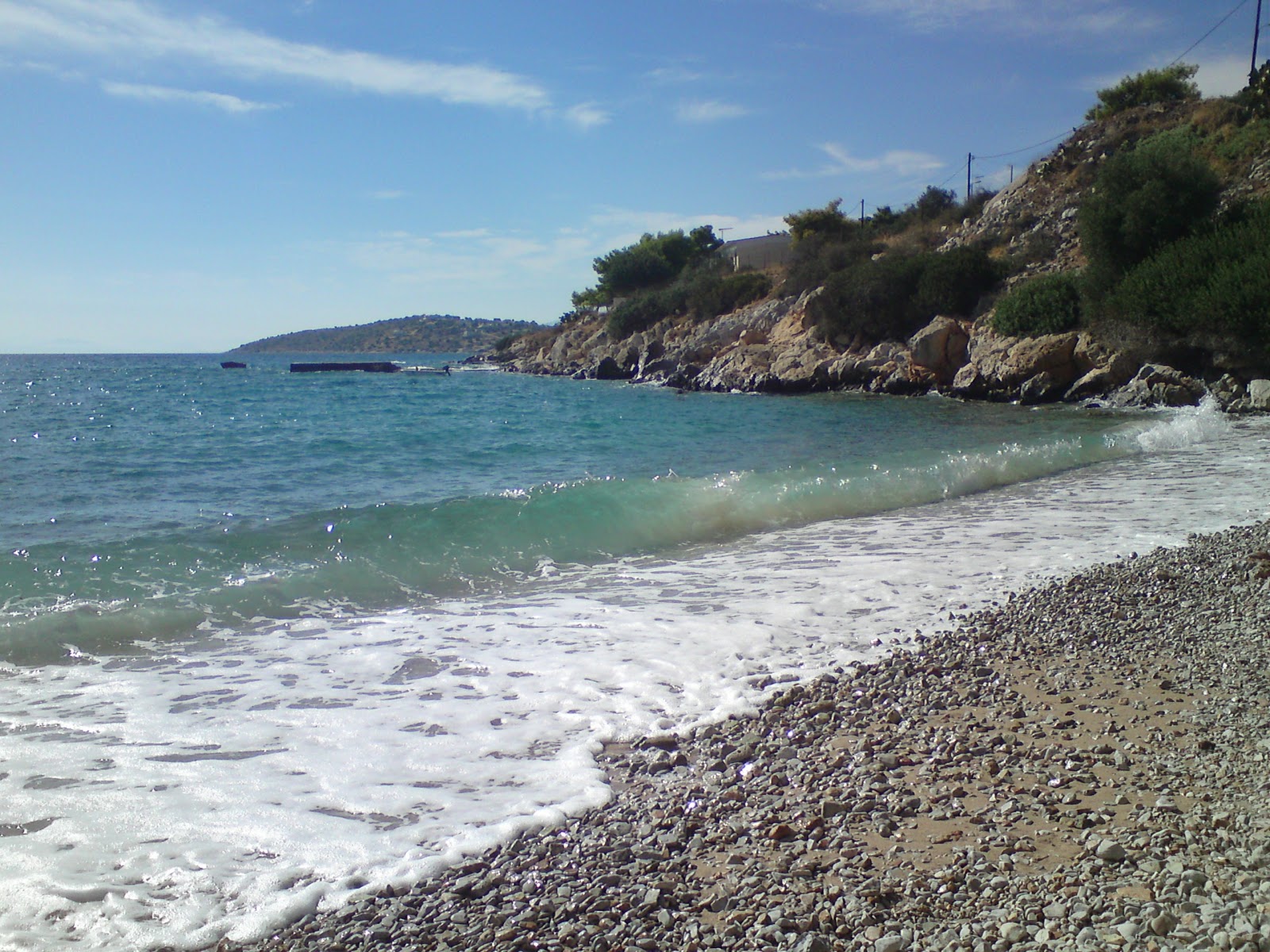 Fotografie cu Kithiron beach cu o suprafață de apa pură turcoaz