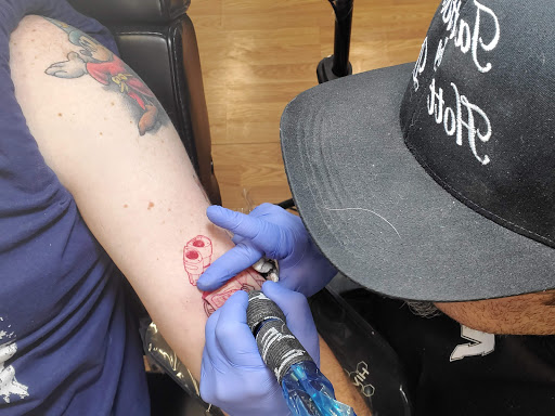 Explore construction worker tattoo ideas, creative tattoo ideas in Council Bluffs, available at Lil Bros Tattoo