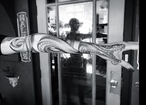 Explore scoliosis tattoo ideas, creative tattoo ideas in San Diego, available at Remington Tattoo Parlor